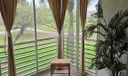 Back Patio Enclosed Patio Overlooking Golf Course And Water