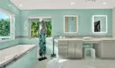 Master Bathroom Features Two Sinks and a Luxurious Bathtub for Relaxing!