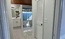 Primary Bed - Man's Closet and Woman's Closet - Primary Bath