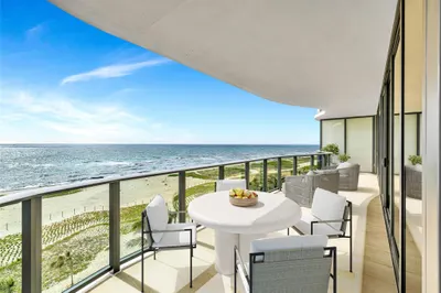Spacious terrace overlooking the beach and ocean (