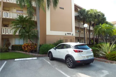 Parking space 117, in front of bldg