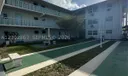 1050 E Sample Rd #202 Photo