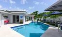 Saltwater pool and marble pool deck