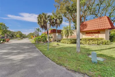 The condo entrance to the community is welcoming a