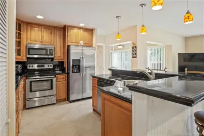 One of a kind kitchen island with sink and dishwas