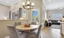 Wood look porcelain tile in family room, kitchen and breakfast area