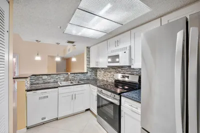 5011 Wiles Road #Unit 303 1