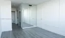 Bedroom hallway into bathroom