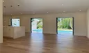 LIVING ROOM OPENS TO THE POOL PATIO