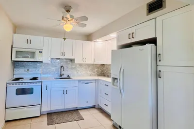 WOW! Updated 2/2 Corner Penthouse With Water Views