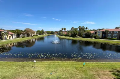 BEAUTIFUL LAKE VIEW FROM LIVING ROOM & BALCONY