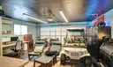 AIR CONDITIONED 2 CAR GARAGE CURRENTLY USED AS OFFICE / "MAN CAVE"!