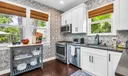 Discover a newly updated kitchen featuring sleek stainless steel appliances and dining service for 10. Enjoy the convenience of both Keurig and filter coffee options in this fully equipped culinary space.