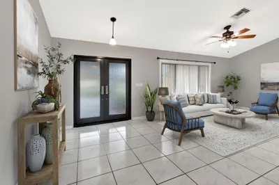 Double rain glass impact doors welcome you to wide