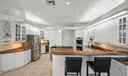 Breakfast bar and lots of cabinets