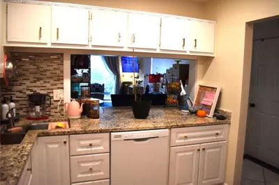 Updated kitchen with granite counters.