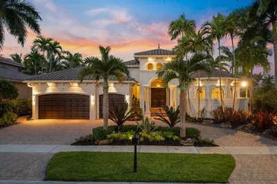 Front Elevation with Lush Tropical Landscaping, Cu