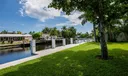 Brand new raised concrete seawall w/ a 30 foot dock (2023