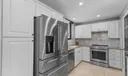 Kitchen features high end Kitchen-Aid appliances