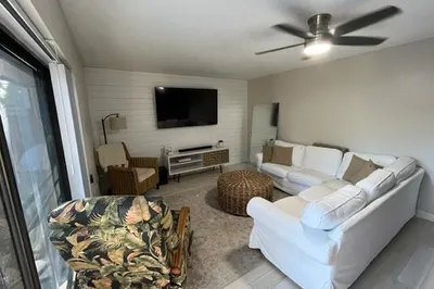 living room w shiplap accent wall