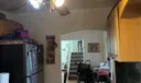 Kitchen has little counter sitting area