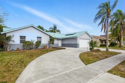 Exterior Front w/ Circular Driveway