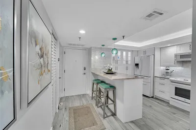 Open kitchen and renovated to detail. You will not