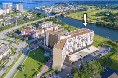 01_aerial-front_336 Golfview #PH1_Gemini