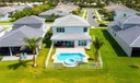 Aerial View | Backyard | Pool/Jacuzzi | Lake View | Covered & Fenced-in Patio