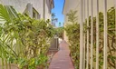 PRIVATE WALKWAY TO THE POOL & BACKYARD