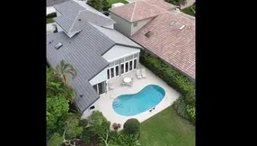 Frenchman’s Creek Estate with Lake & Pool Views