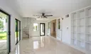 Florida room with spiral stair case