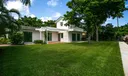 Rear of house with Double patio and expansive lawn