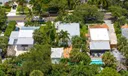 Aerial views of this exquisite villa with private guest house, pool and outdoor amenities to enjoy with family & friends.