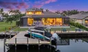 The back of the home in the evening.