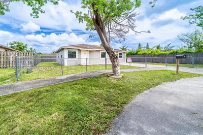 705 NW 13th Ter 1