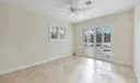 bedroom #2 with pool and waterfront views