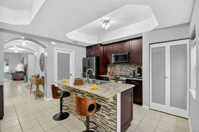 Sensational kitchen with frosted glass doors to pa