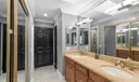 Primary bath features dual sinks and closets!