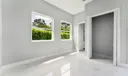 675 NE Moss Rose Place Photo