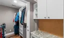 Secure closet off of living room with keyed dead-bolt and heavy duty door once used for a gun safe