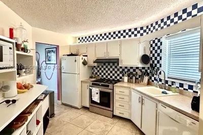 6555 W Broward Blvd #306 1