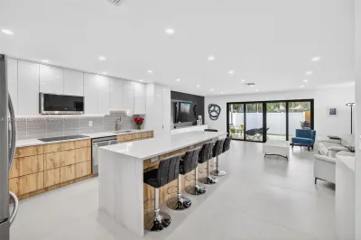 WOW! Beautiful porcelain flooring, huge center isl