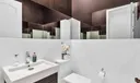 Half bath conveniently located by the family room
