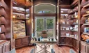Grand office with custom built ins