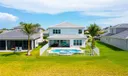 Aerial View | Backyard | Fenced-in & Covered Patio | Lake view