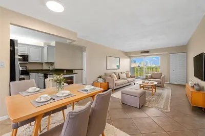 Virtually staged dining and living area
