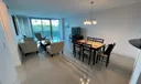 living/dining areas with  view to terrace