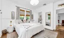 Primary king bedroom with newly updated designer en-suite bathroom.