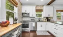 Discover a newly updated kitchen featuring sleek stainless steel appliances and dining service for 10. Enjoy the convenience of both Keurig and filter coffee options in this fully equipped culinary space.